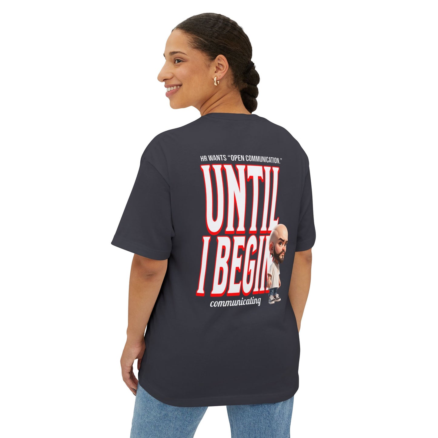 Person wearing a black t-shirt with text and a graphic on the back, standing against a white background