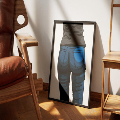 Digitalized denim artwork framed on floor with chair and bookshelf nearby.