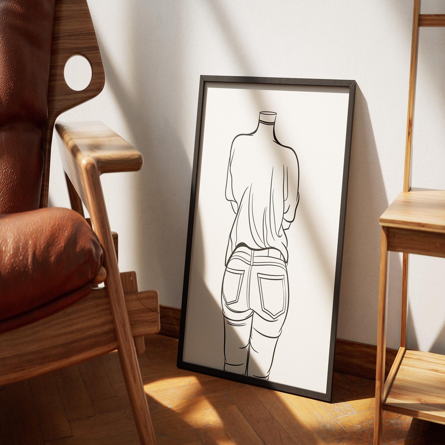 Line art jeans artwork in a modern room setting.
