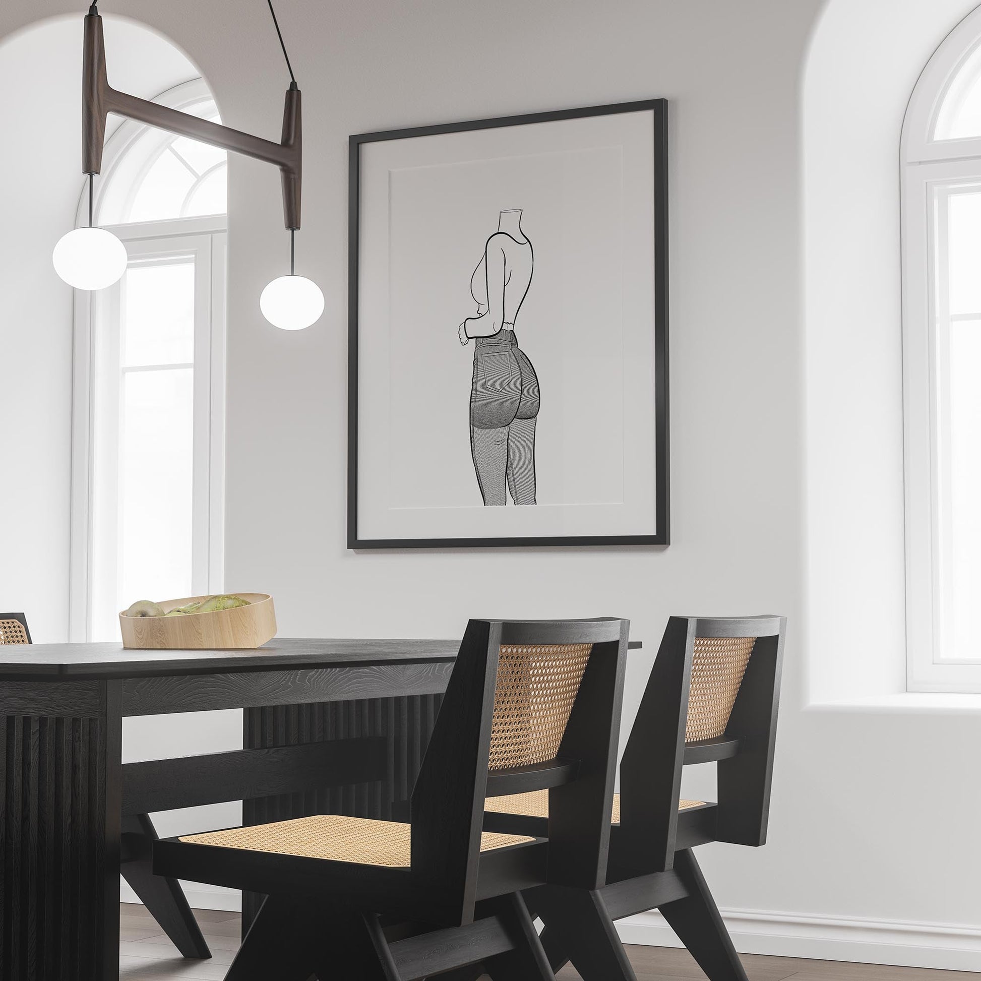 Line art of a model wearing high-waisted jeans and a crop top displayed on a wall.