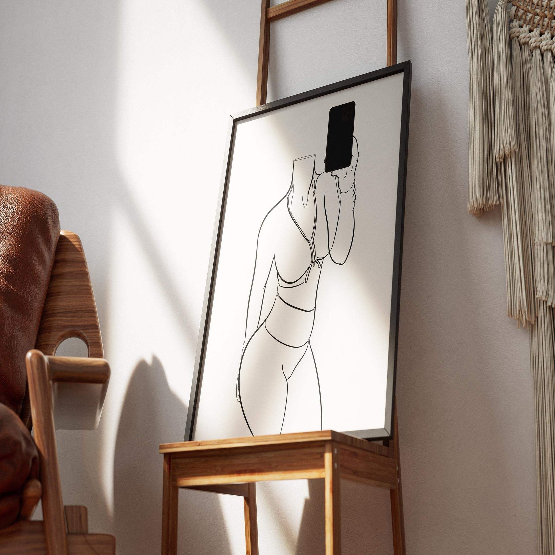 Athletic Model 29 line art digital print featuring a headless figure in athletic wear, framed and displayed indoors.